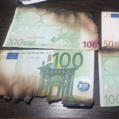 Обмін згорілих євро та доларів в Україні